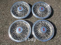 1981 to 1988 Oldsmobile Cutlass wire spoke 14 inch hubcaps wheel covers nice