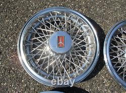 1981 to 1988 Oldsmobile Cutlass wire spoke 14 inch hubcaps wheel covers nice