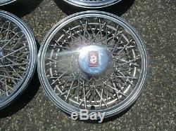 1986 Oldsmobile Cutlass Supreme 14 inch metal wire spoke hubcaps wheel covers