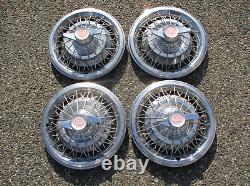 Factory 1964 1965 Pontiac 15 inch wire spoke spinner hubcaps wheel covers