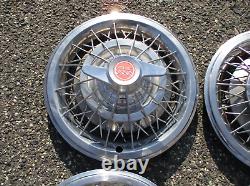 Factory 1964 1965 Pontiac 15 inch wire spoke spinner hubcaps wheel covers