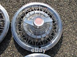 Factory 1964 1965 Pontiac 15 inch wire spoke spinner hubcaps wheel covers
