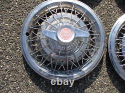 Factory 1964 1965 Pontiac 15 inch wire spoke spinner hubcaps wheel covers