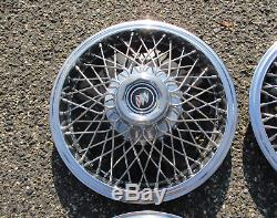 Factory 1983 to 1995 Buick Century 14 inch wire spoke hubcaps wheel covers