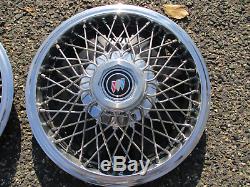 Factory 1983 to 1995 Buick Century 14 inch wire spoke hubcaps wheel covers