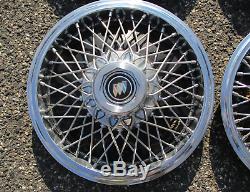 Factory 1983 to 1995 Buick Century 14 inch wire spoke hubcaps wheel covers