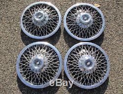 Factory 1983 to 1995 Buick Century 14 inch wire spoke hubcaps wheel covers