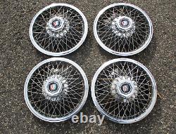 Factory 1983 to 1995 Buick Century 14 inch wire spoke hubcaps wheel covers