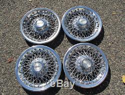Factory Chevy Camaro Berlinetta 14 inch wire spoke hubcaps wheel covers nice
