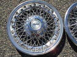 Factory Chevy Camaro Berlinetta 14 inch wire spoke hubcaps wheel covers nice