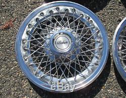 Factory Chevy Camaro Berlinetta 14 inch wire spoke hubcaps wheel covers nice