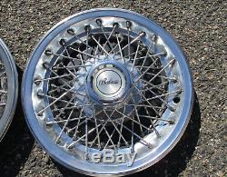 Factory Chevy Camaro Berlinetta 14 inch wire spoke hubcaps wheel covers nice