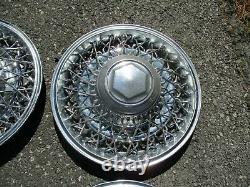Genuine 1982 to 1989 Dodge Diplomat 15 inch wire spoke hubcaps wheel covers