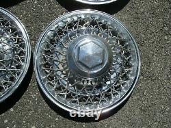Genuine 1982 to 1989 Dodge Diplomat 15 inch wire spoke hubcaps wheel covers