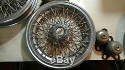 Genuine 1982 to 1996 Chevy Caprice 15 inch wire spoke hubcaps wheel covers set
