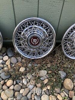 OEM 15 1986 -1992 Cadillac Fleetwood Brougham wire spoke hubcap wheel cover