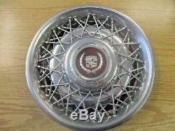 One 1986 to 1992 Cadillac Fleetwood Brougham wire spoke hubcap wheel cover