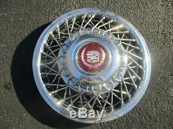 One 1987 1988 Cadillac Deville wire spoke locking 14 inch hubcap wheel cover