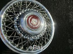 One 1987 1988 Cadillac Deville wire spoke locking 14 inch hubcap wheel cover