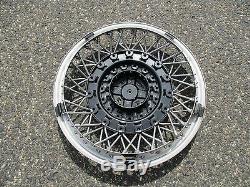 One 1987 1988 Cadillac Deville wire spoke locking 14 inch hubcap wheel cover