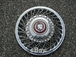 One 1987 1988 Cadillac Deville wire spoke locking 14 inch hubcap wheel cover