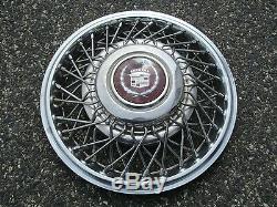 One 1987 1988 Cadillac Deville wire spoke locking 14 inch hubcap wheel cover