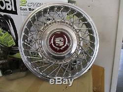 One 1987 1988 Cadillac Deville wire spoke locking 14 inch hubcap wheel cover