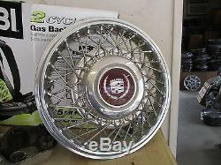 One 1987 1988 Cadillac Deville wire spoke locking 14 inch hubcap wheel cover