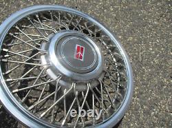 One NOS 1991 to 1994 Oldsmobile Cutlass Ciera wire spoke hubcap wheel cover