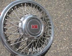 One NOS 1991 to 1994 Oldsmobile Cutlass Ciera wire spoke hubcap wheel cover