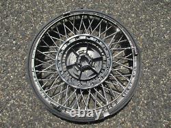 One NOS 1991 to 1994 Oldsmobile Cutlass Ciera wire spoke hubcap wheel cover