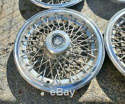 Set of 4 1980s Vintage Cadillac Hearse Limo 15 Wire Spoke Hubcaps Wheel Covers