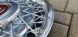 Two 1986 to 1992 Cadillac Fleetwood Brougham wire spoke hubcap wheel covers