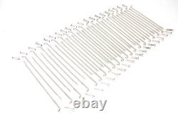 En français, cela se traduirait par : Ensemble de rayons de 18 pouces plaqués nickel pour Harley, adapté pour l'avant ou l'arrière.