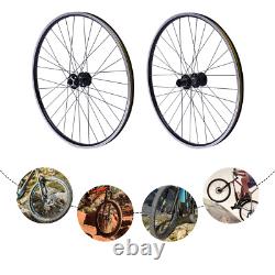 Jeu de roues MTB 29 avec jantes en alliage d'aluminium, système de libération rapide, rayons plats noirs à l'avant et à l'arrière.